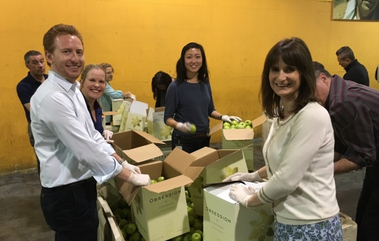 People packing food at a foodbank