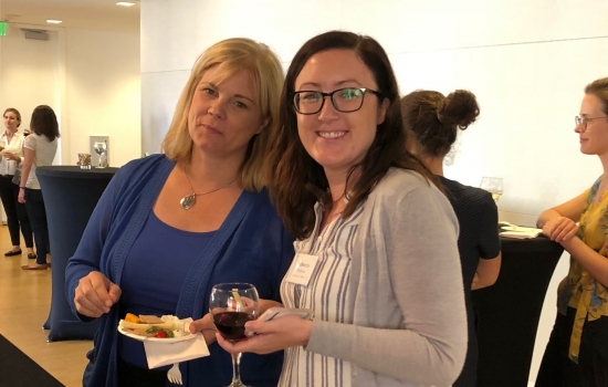 Two women at Farella’s Women’s Leadership Committee’s meeting