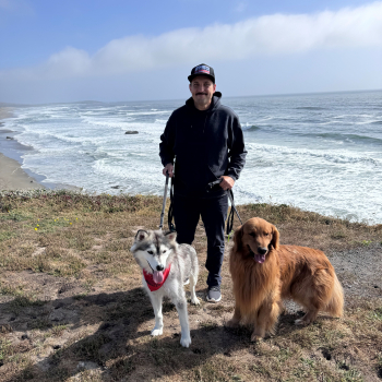 Kyle McLorg Outside the Office with his dogs